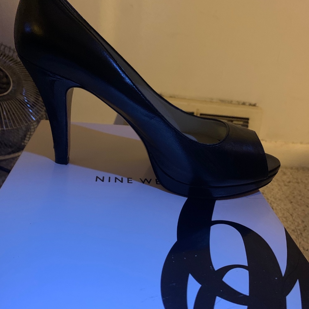 Black open-toe pumps